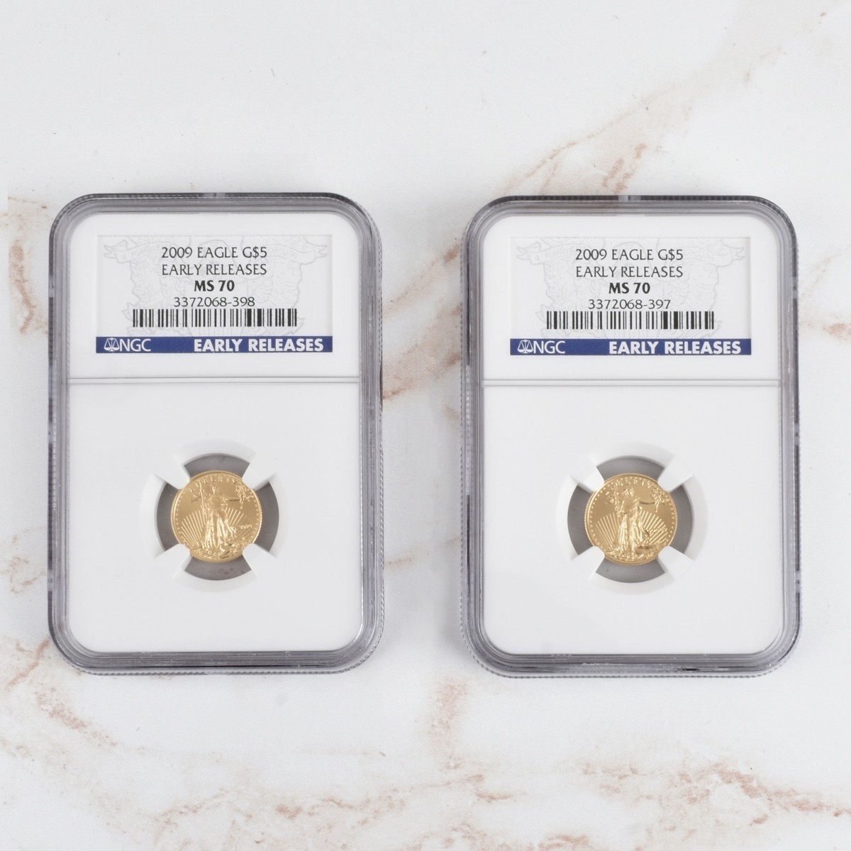 Two 2009 US $5 Gold Eagle Early Release