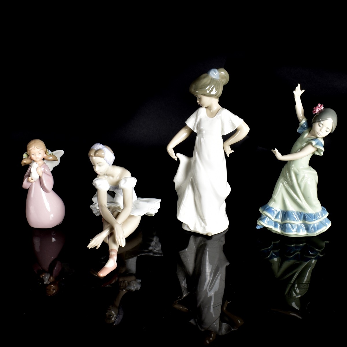 Four Lladro Porcelain Figurines