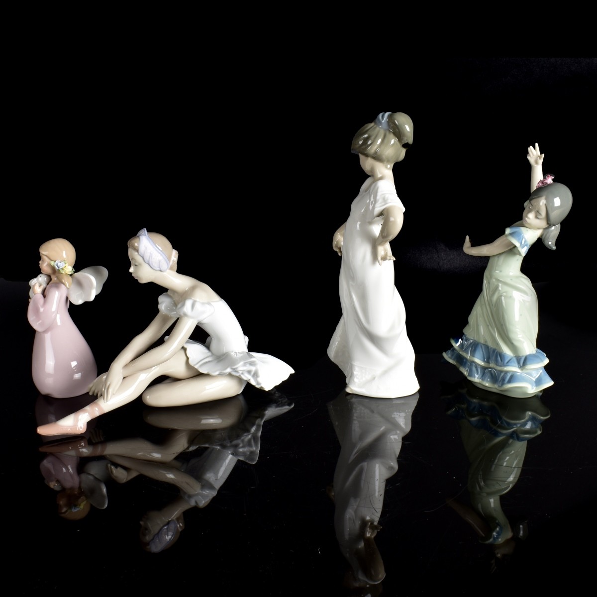 Four Lladro Porcelain Figurines