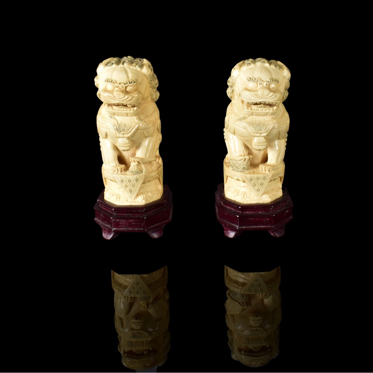 Pair of Chinese Polychrome Foo Dog Figurines