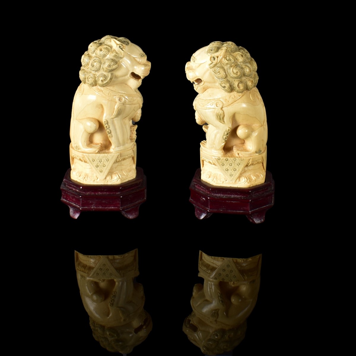 Pair of Chinese Polychrome Foo Dog Figurines