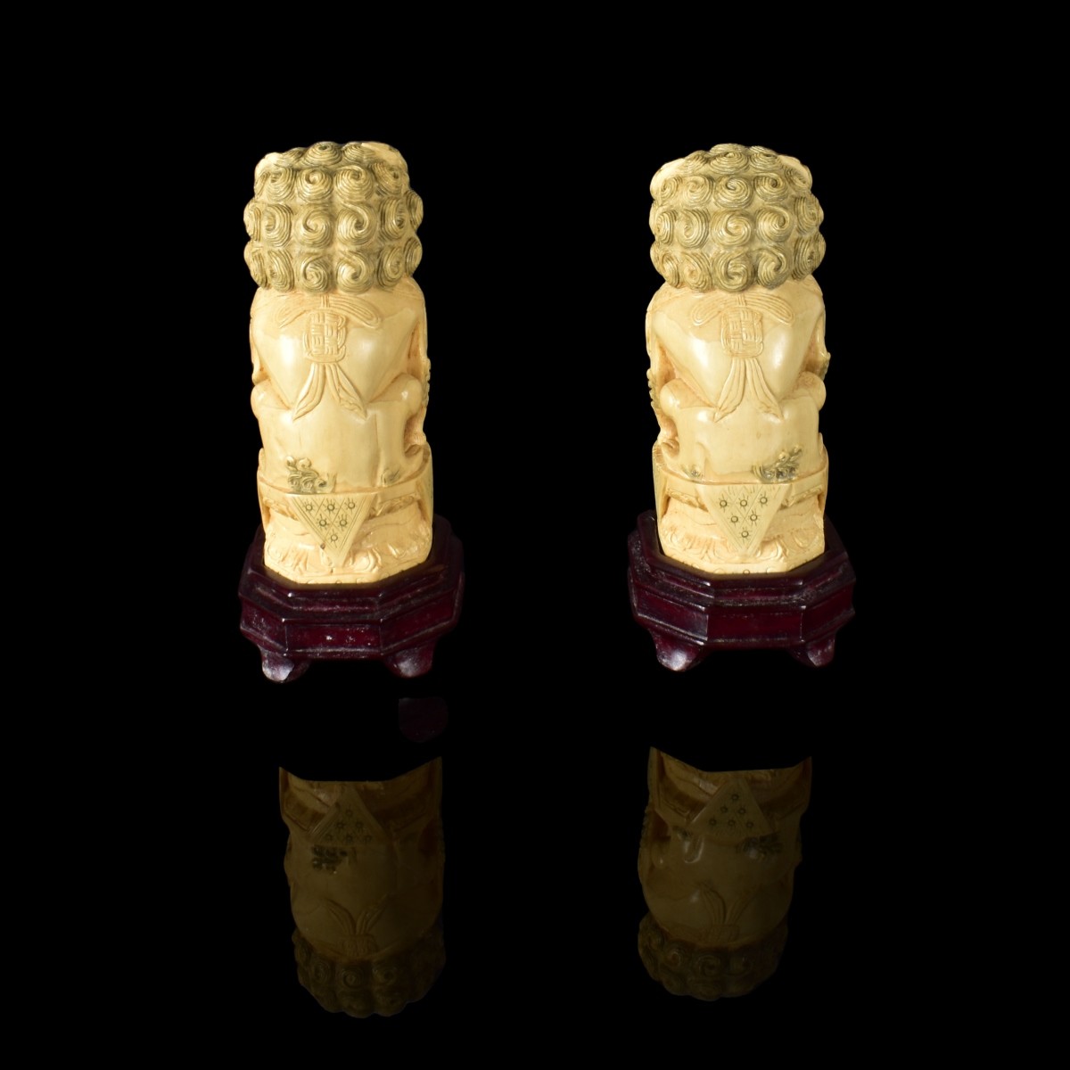 Pair of Chinese Polychrome Foo Dog Figurines