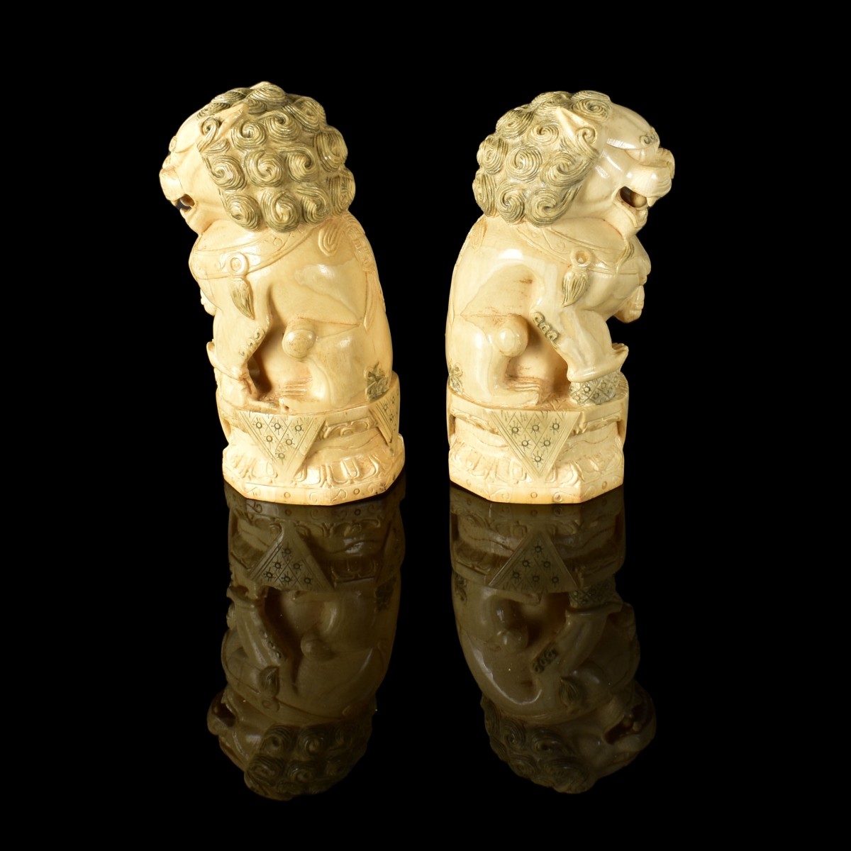 Pair of Chinese Polychrome Foo Dog Figurines