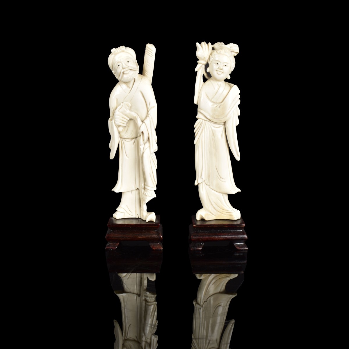 Pair of Chinese Carved Figurines