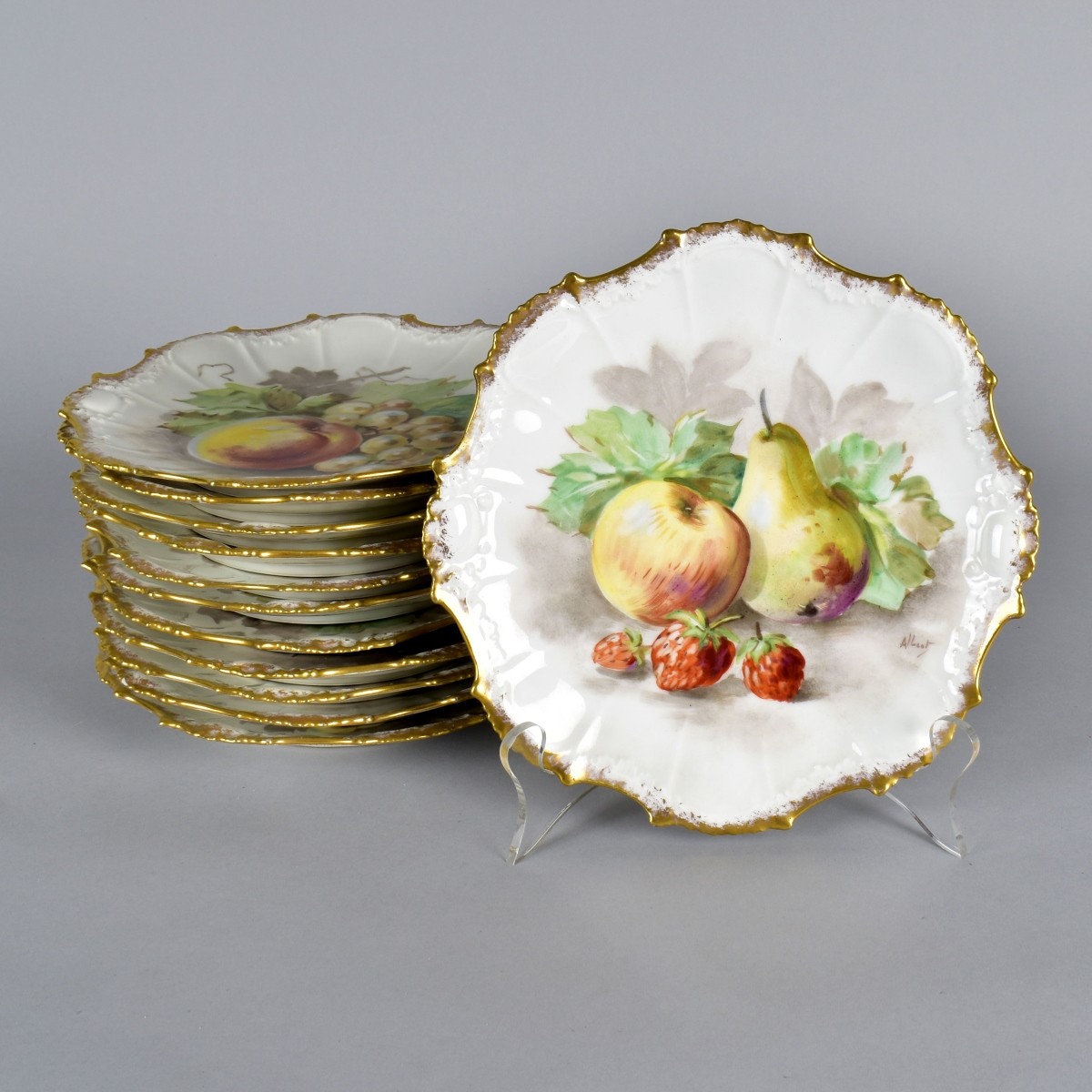 Twelve Antique Limoges Plates