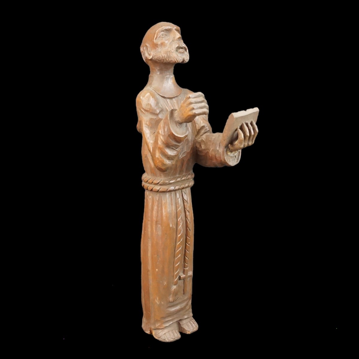 Hand Carved Santos Figurine Reading