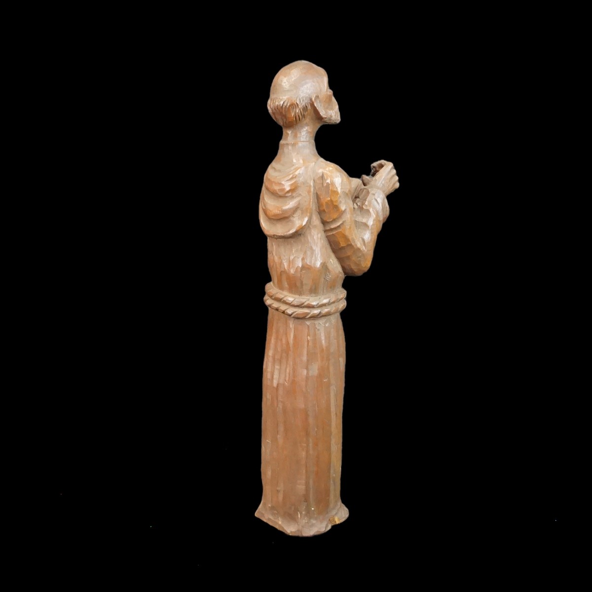 Hand Carved Santos Figurine Reading