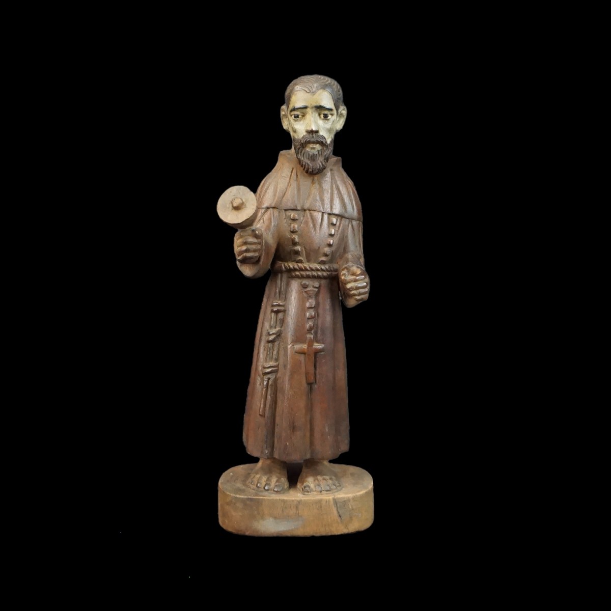 Hand Carved Santos Figurine ringing Bell