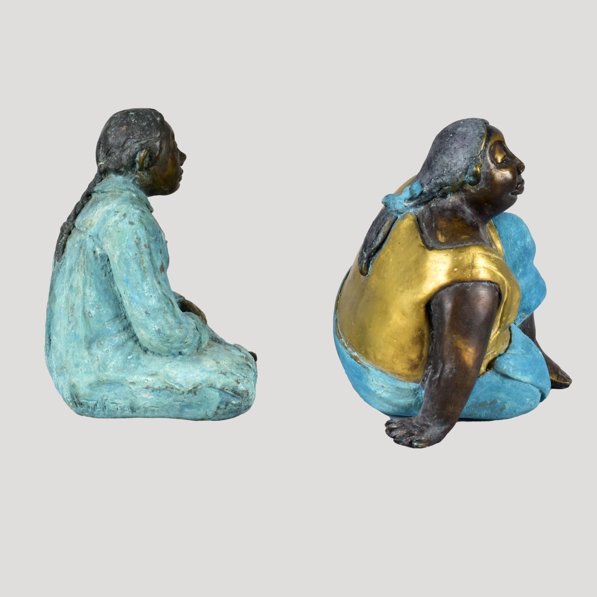 Two (2) Bronze Polynesian Women signed