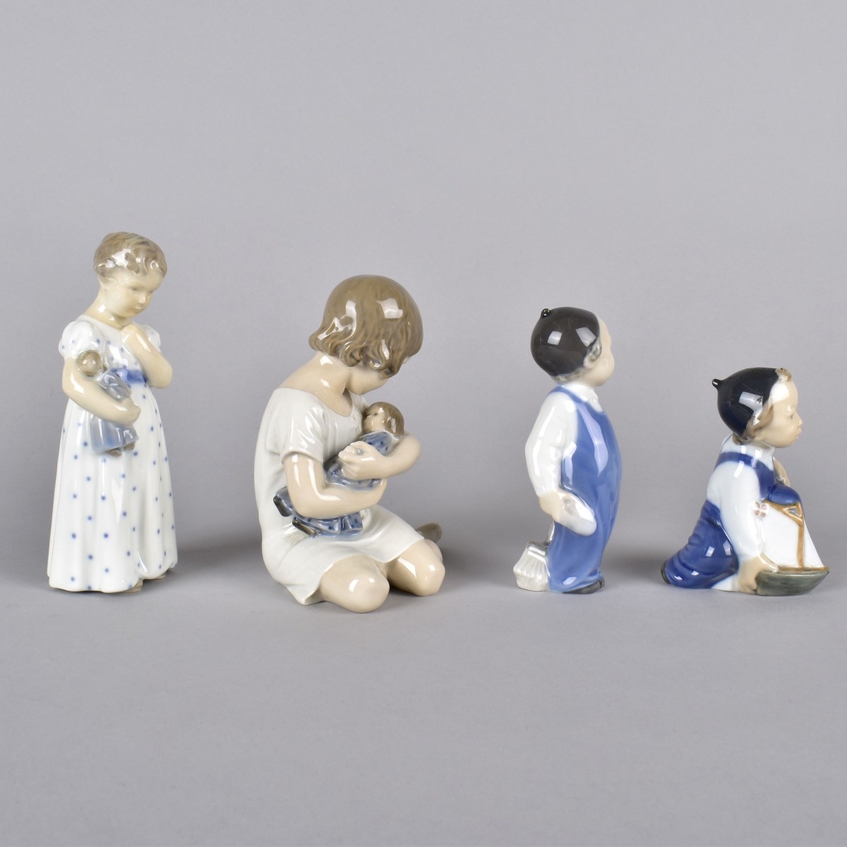 Four Vintage Royal Copenhagen Porcelain Figurines