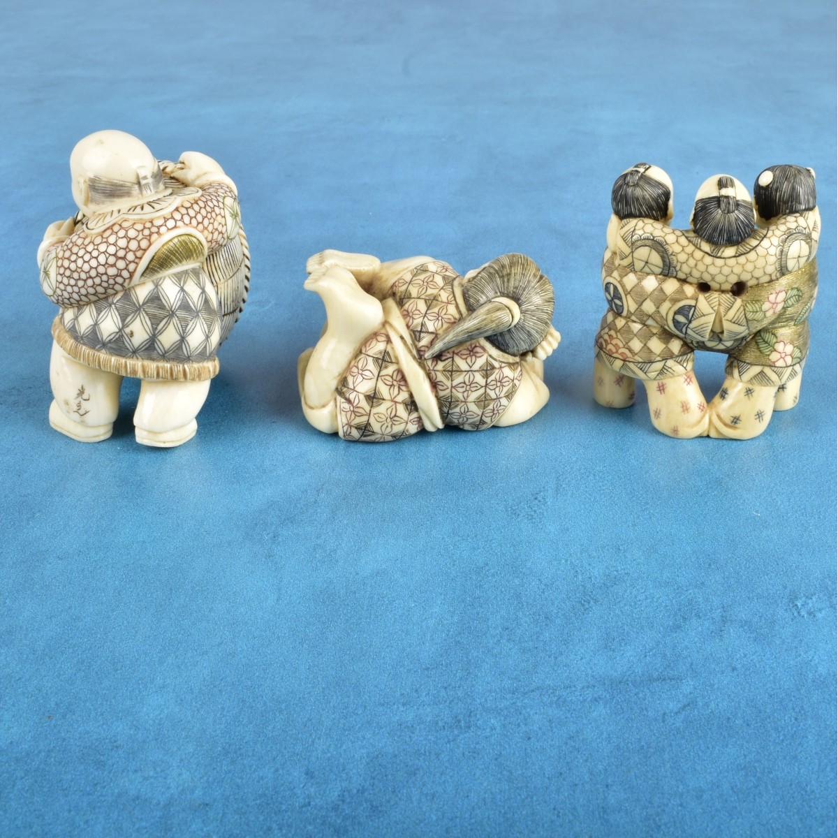 Three Antique Japanese Carved Figurines