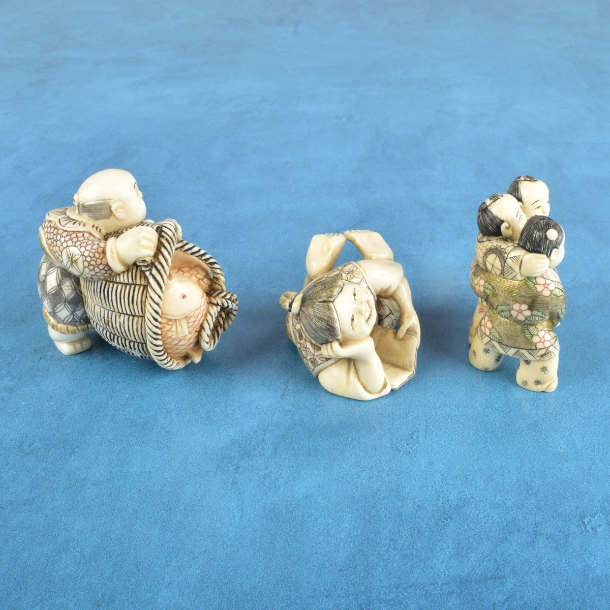 Three Antique Japanese Carved Figurines