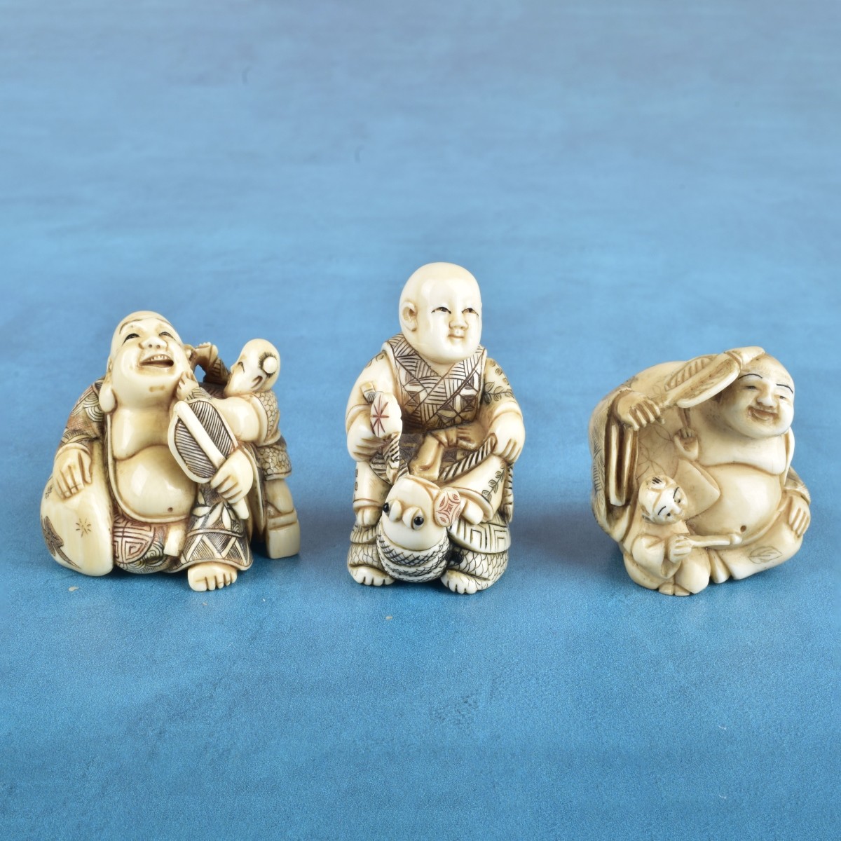 Three Antique Japanese Carved Figurines