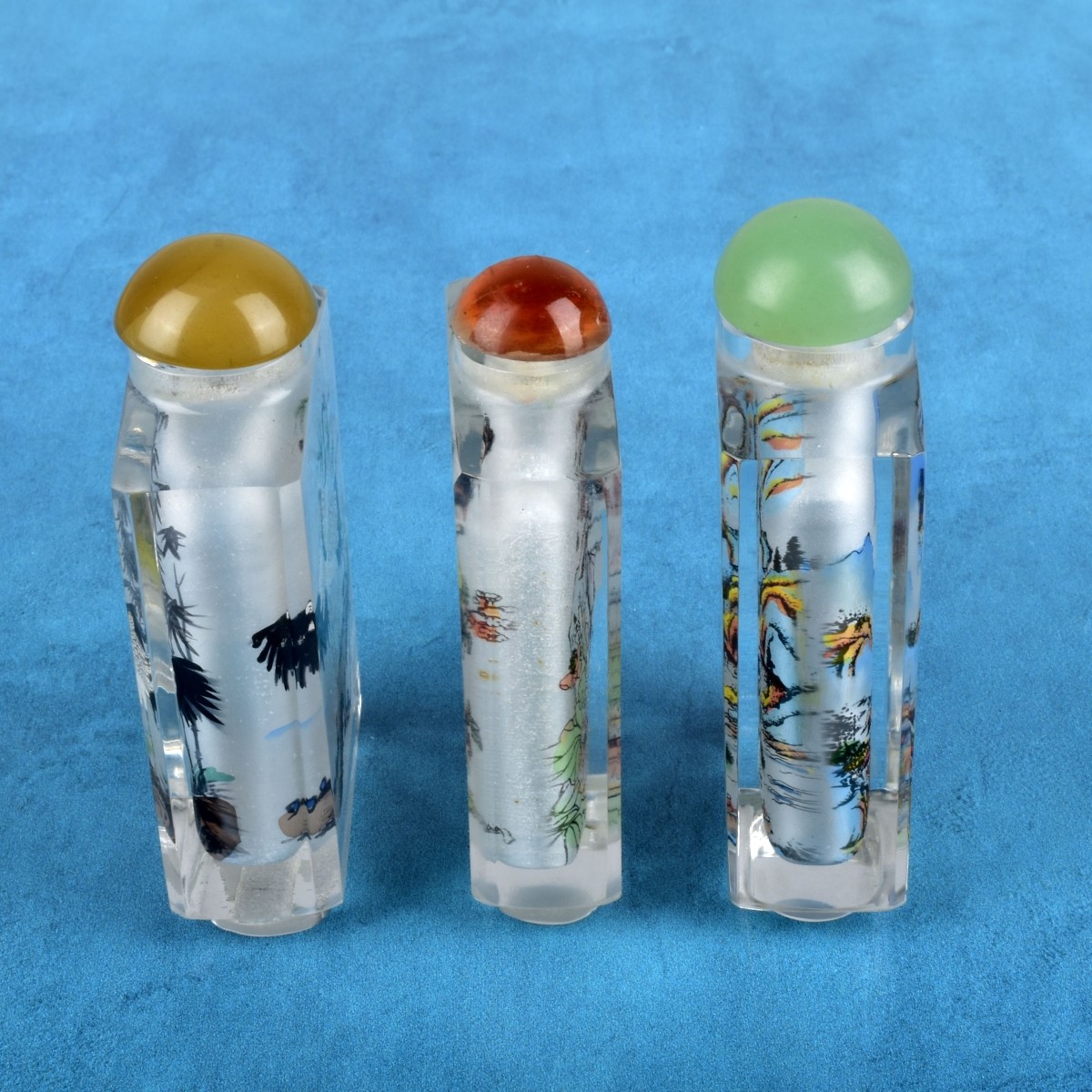 Three Chinese Reverse Painted Snuff Bottles