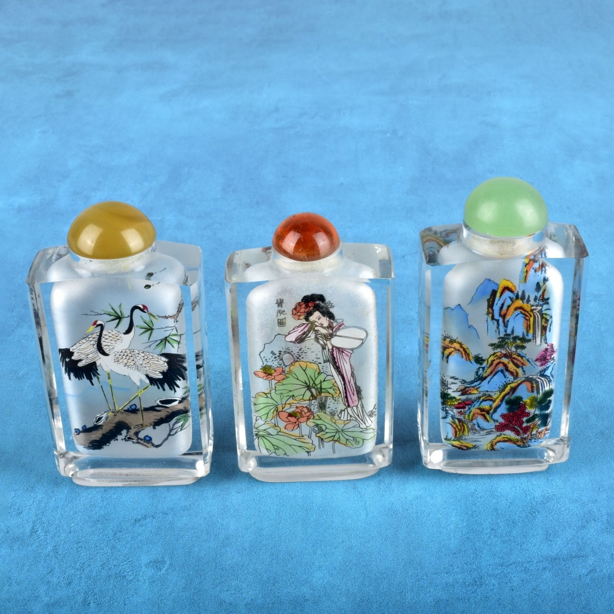 Three Chinese Reverse Painted Snuff Bottles