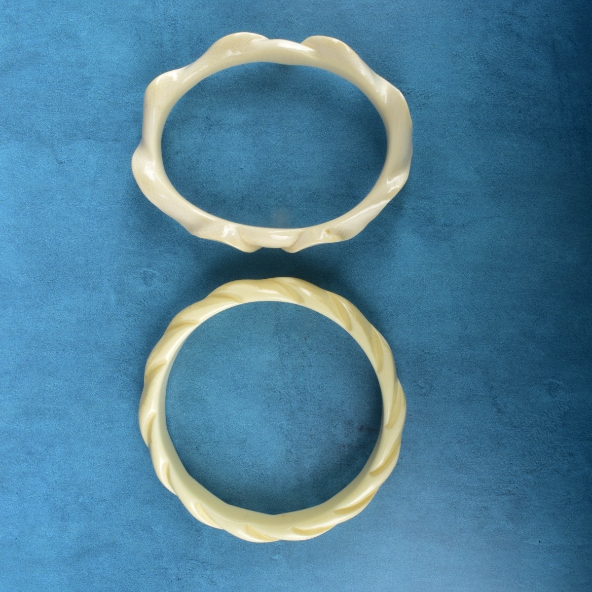 Two Chinese Carved Bangle Bracelets