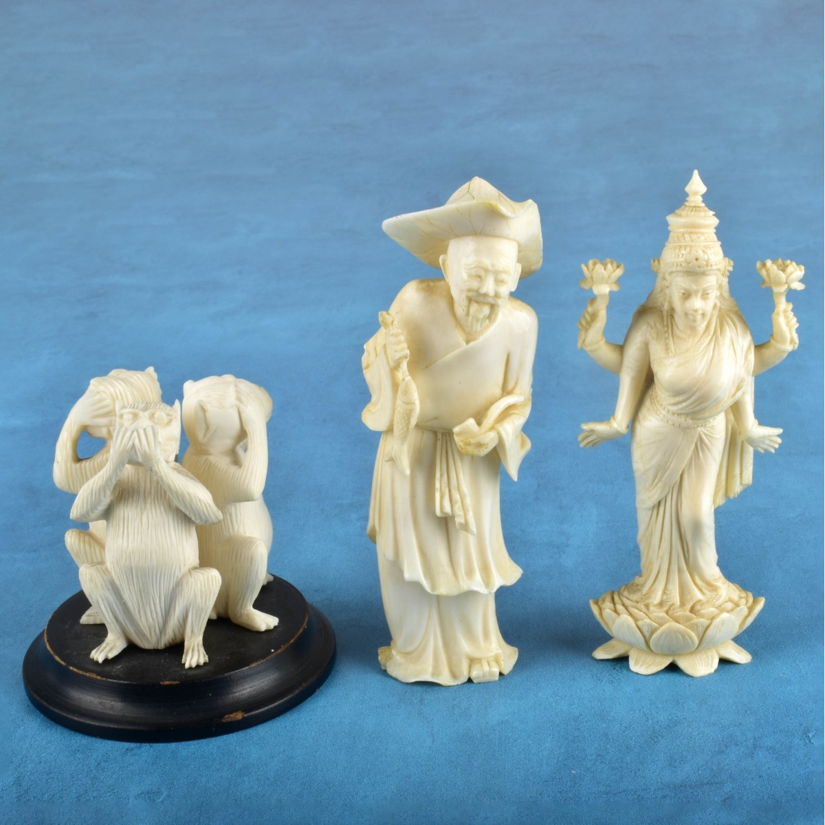 Three Oriental Carved Figurines