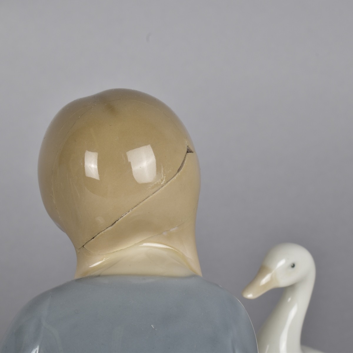 Two Vintage Glazed Porcelain Figurines