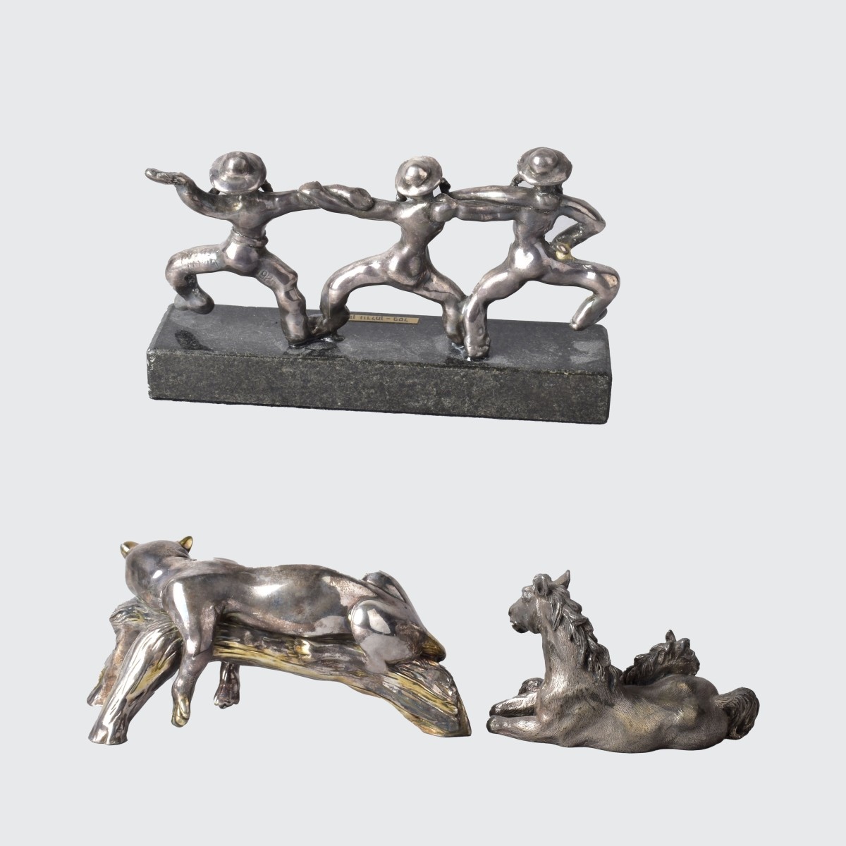 Three Silver-Clad Sculptures