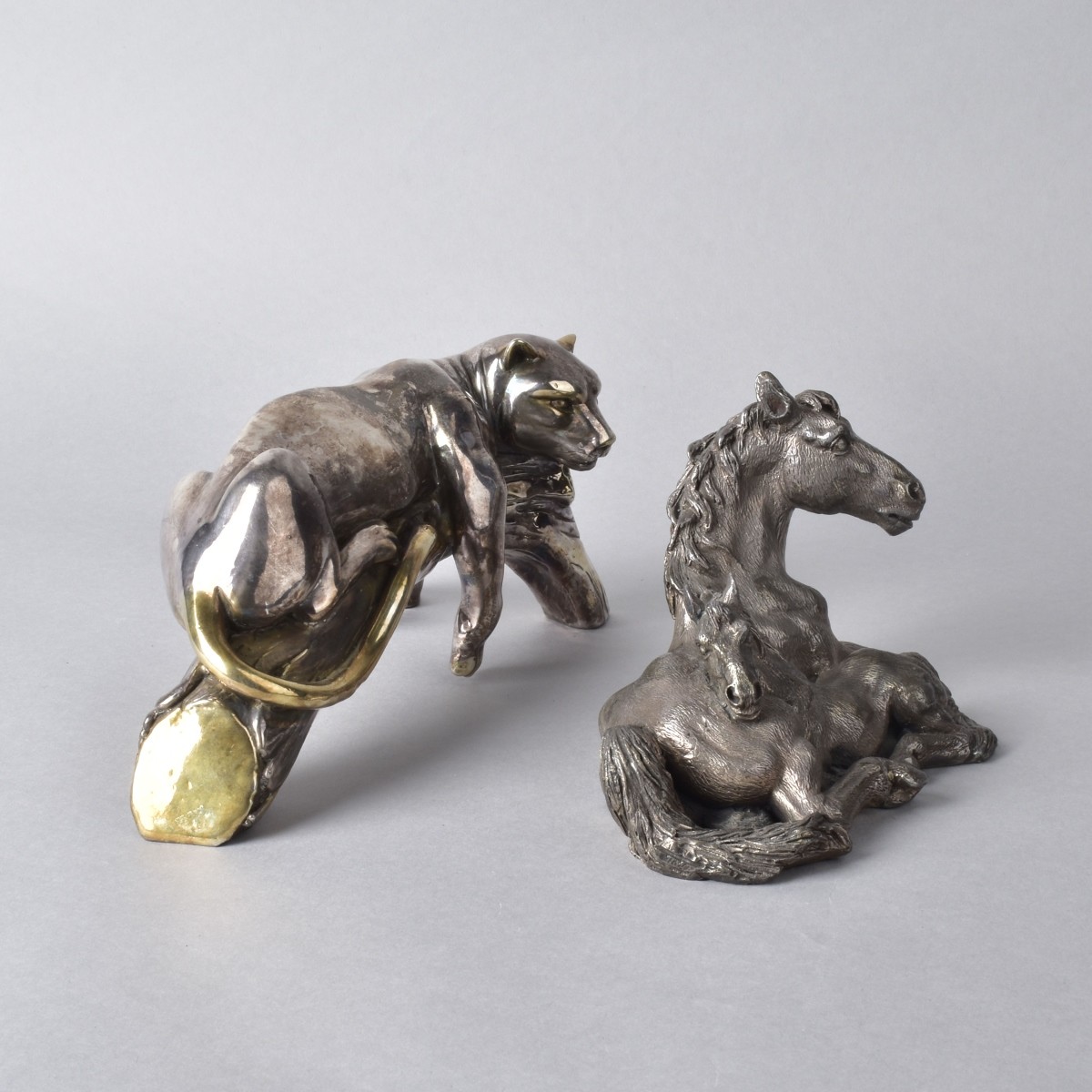 Three Silver-Clad Sculptures