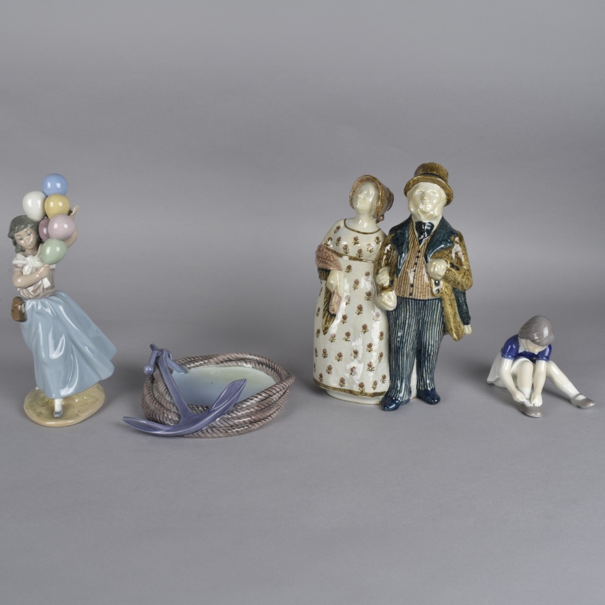 Four Vintage Porcelain Figurines