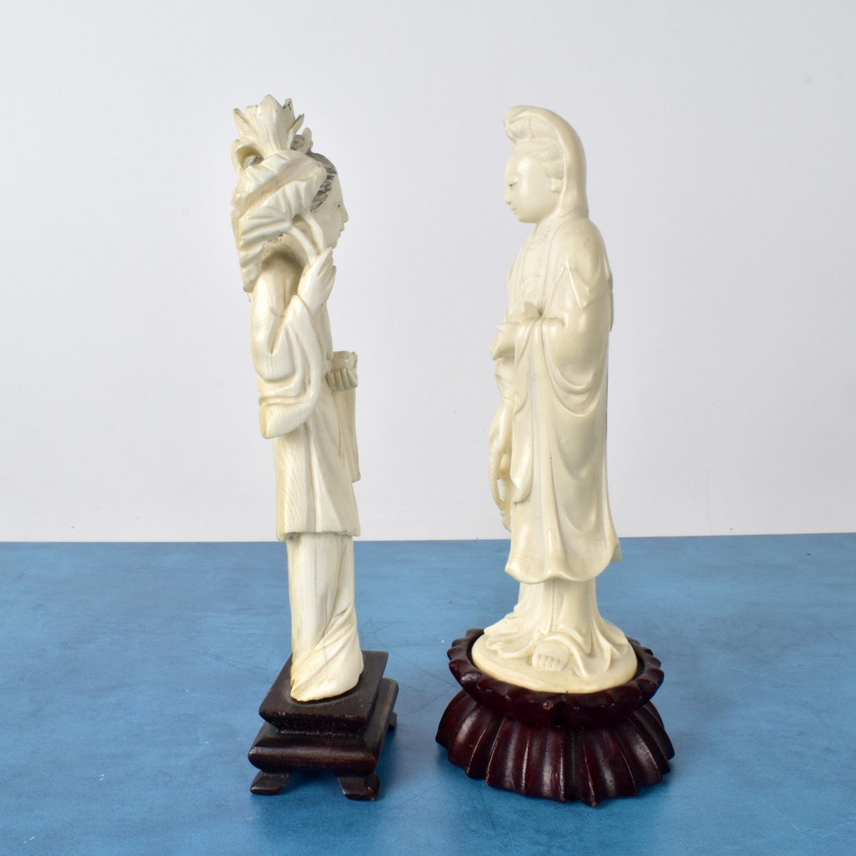 Two Carved Lady Figurines