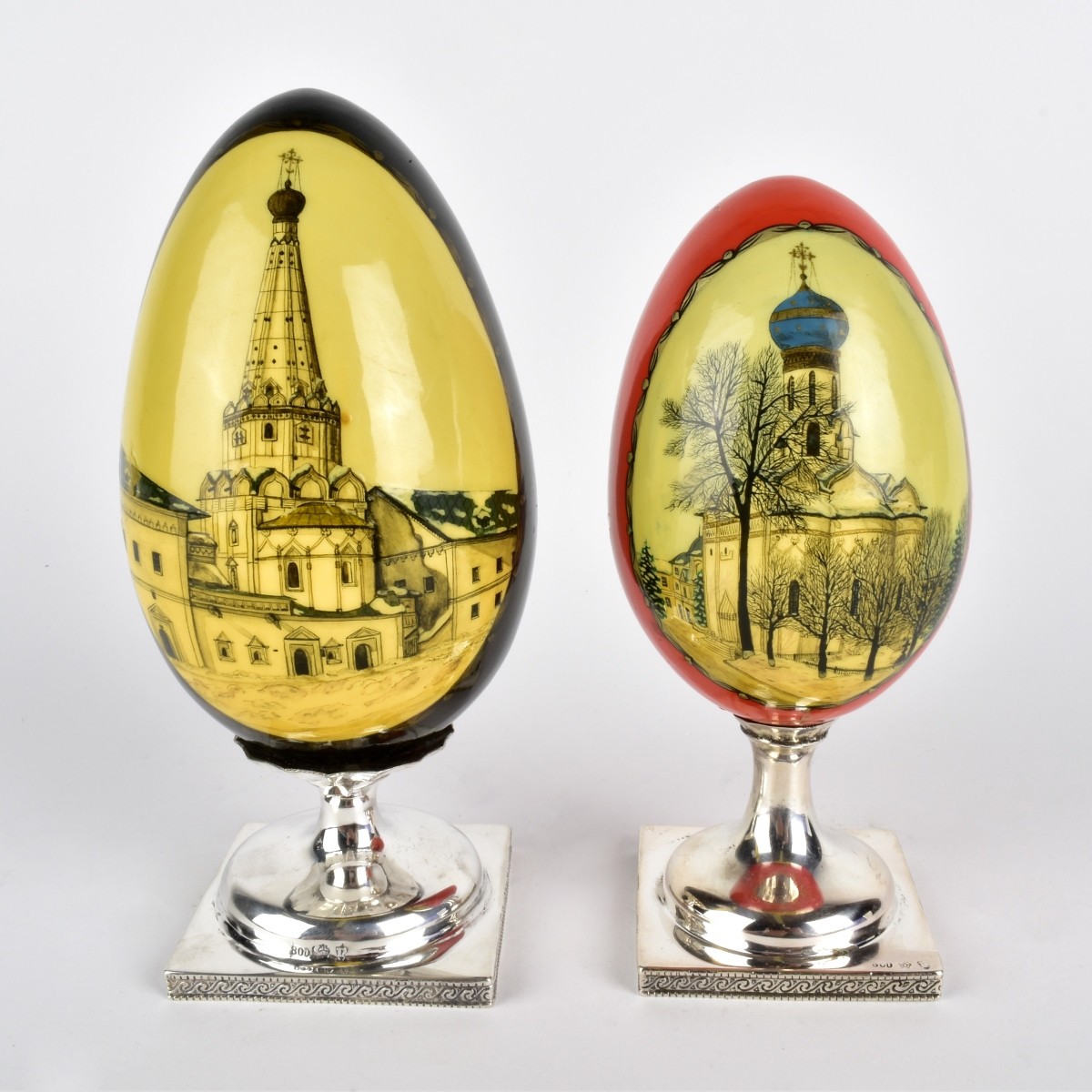 Two Wooden Eggs on Continental Silver Stands