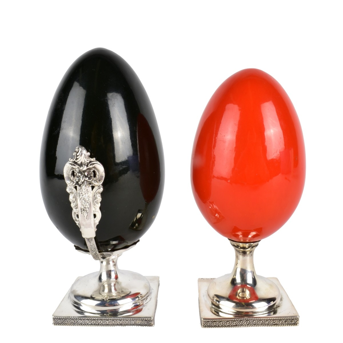 Two Wooden Eggs on Continental Silver Stands