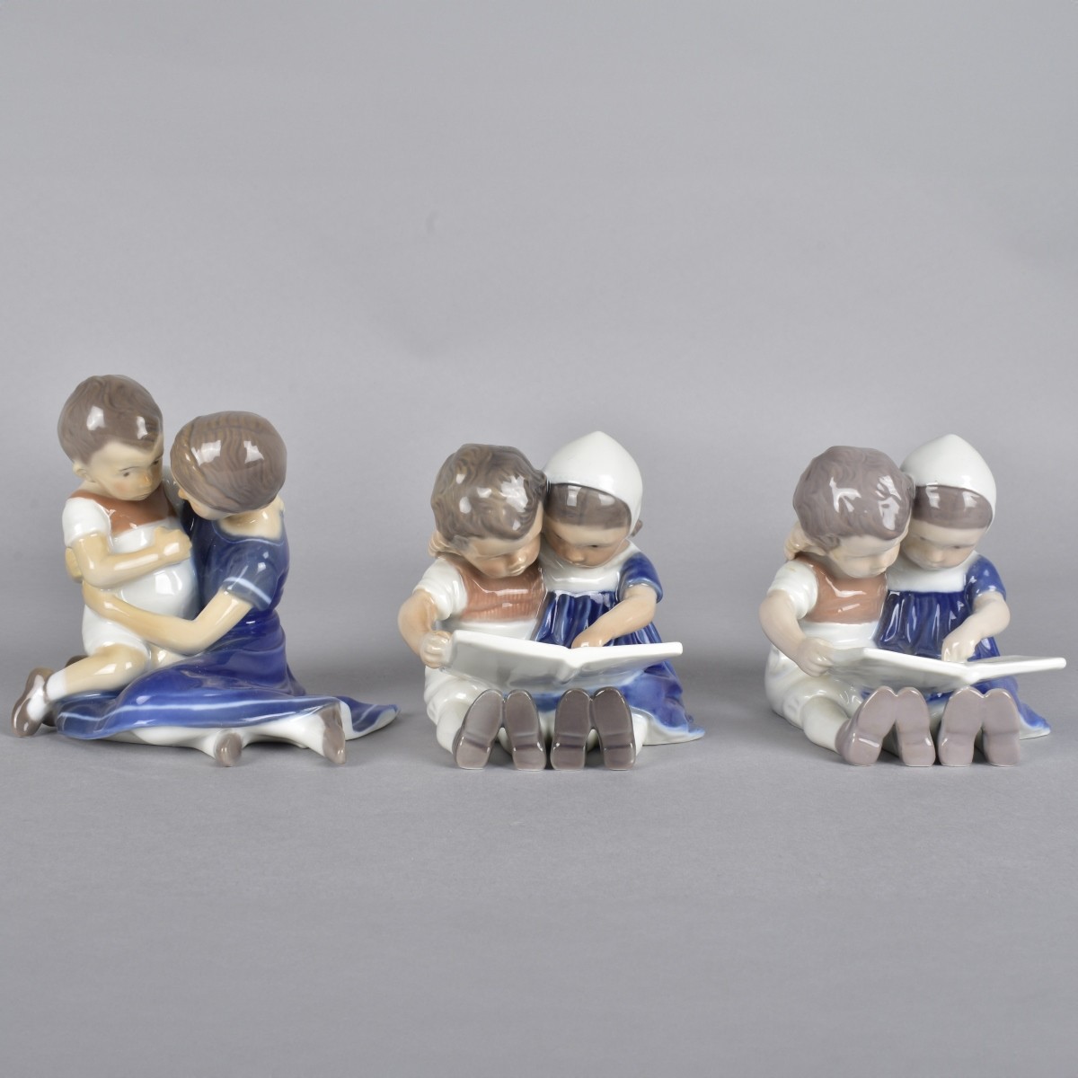 Three Danish Glazed Porcelain Figural Groups