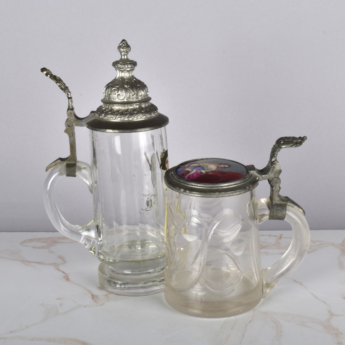 Two German Painted Glass Beer Steins
