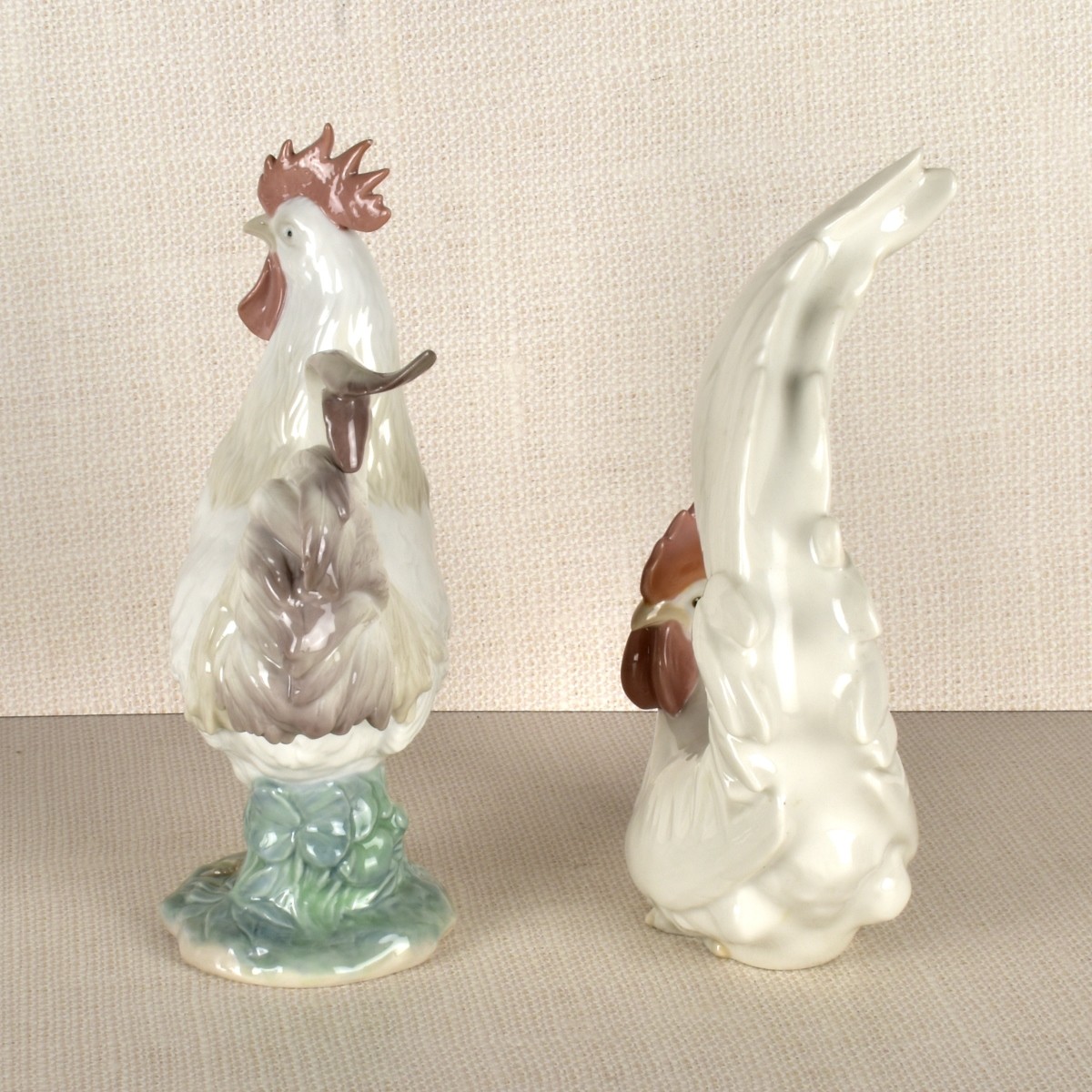 Two Lladro Porcelain Rooster Figurines