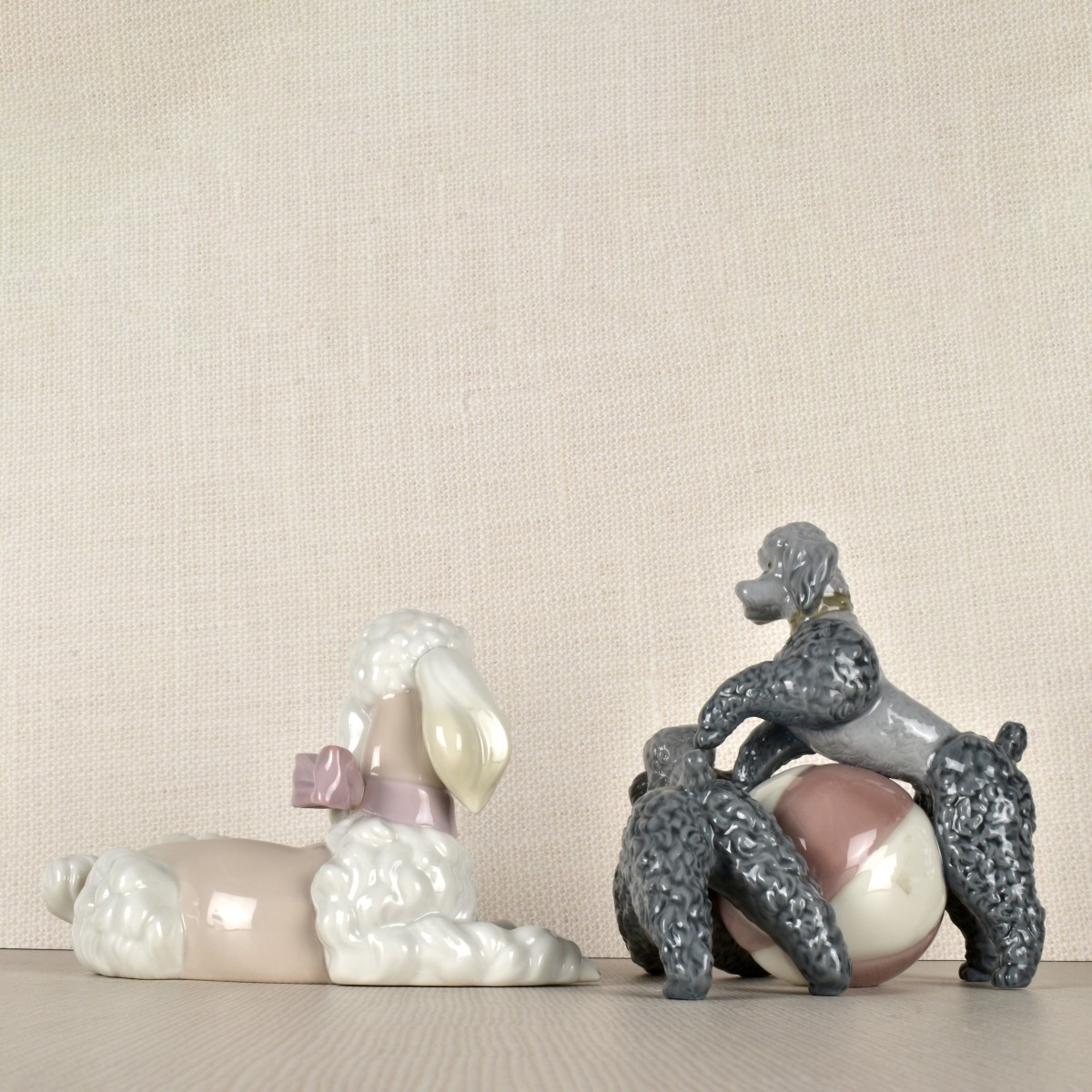 Two Lladro Porcelain Poodle Figurines