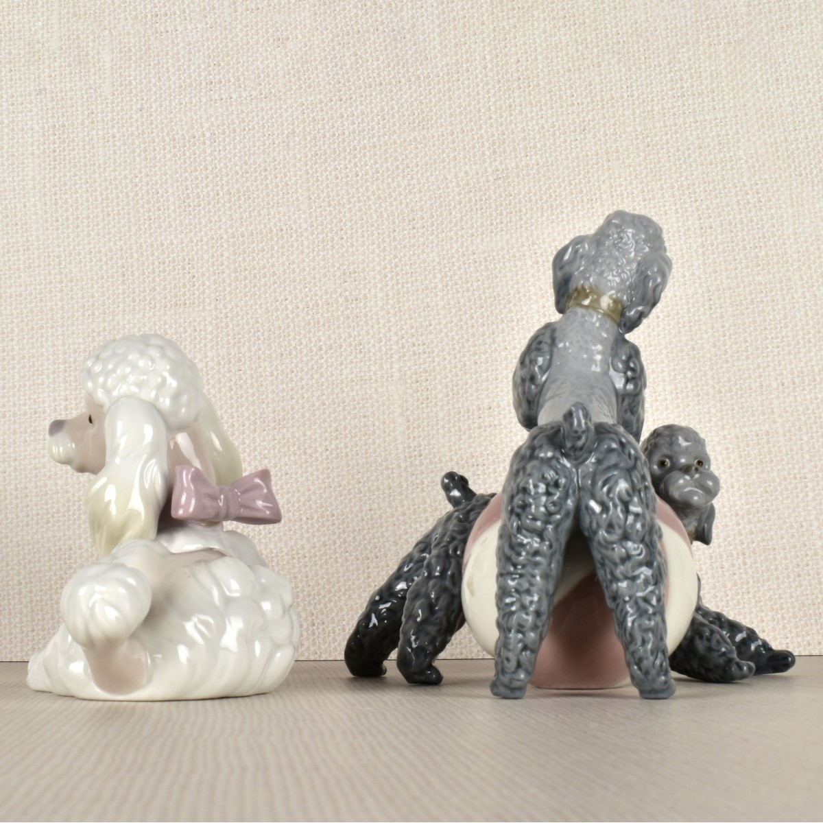 Two Lladro Porcelain Poodle Figurines