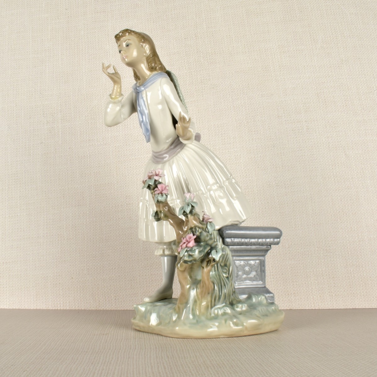 Lladro Figurine of a Girl with Flowers