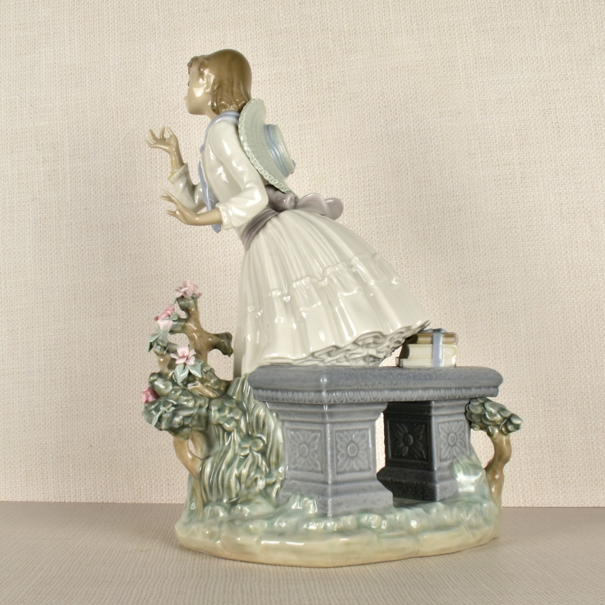Lladro Figurine of a Girl with Flowers