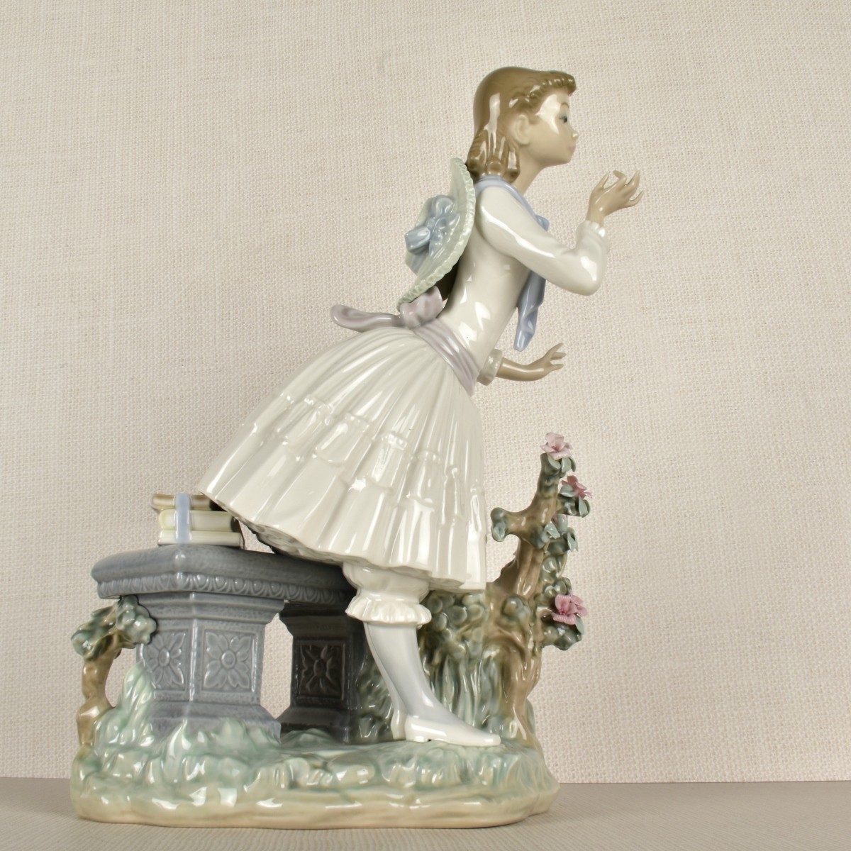 Lladro Figurine of a Girl with Flowers