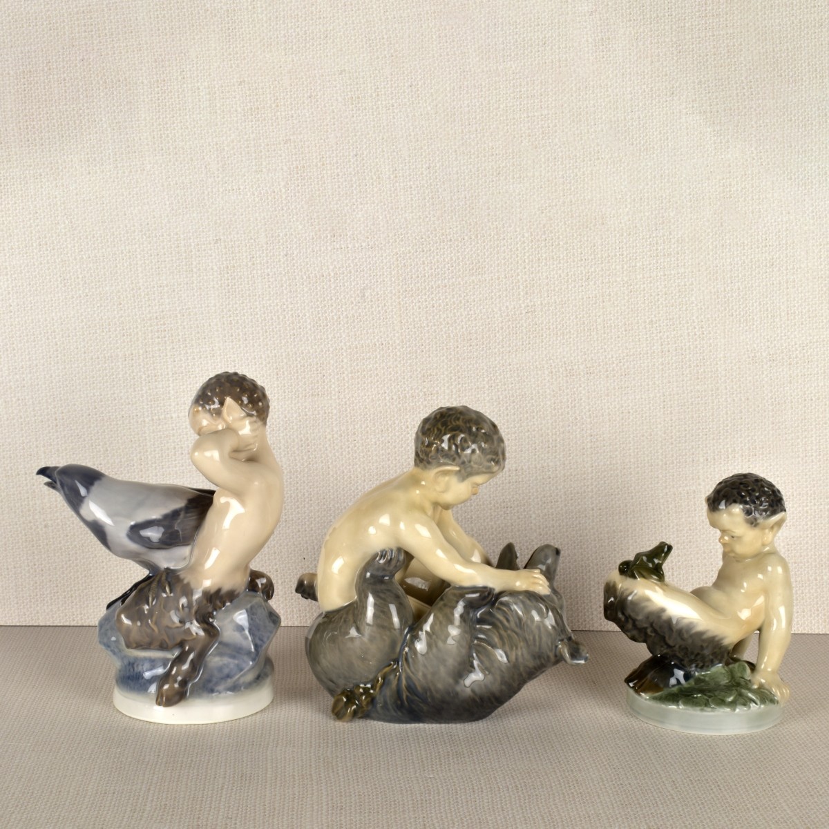 Three Royal Copenhagen Satyr / Pan Figurines