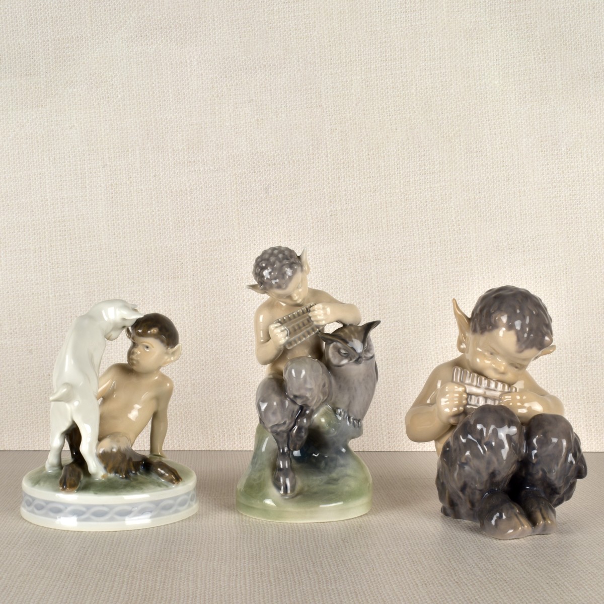 Three Royal Copenhagen Satyr / Pan Figurines