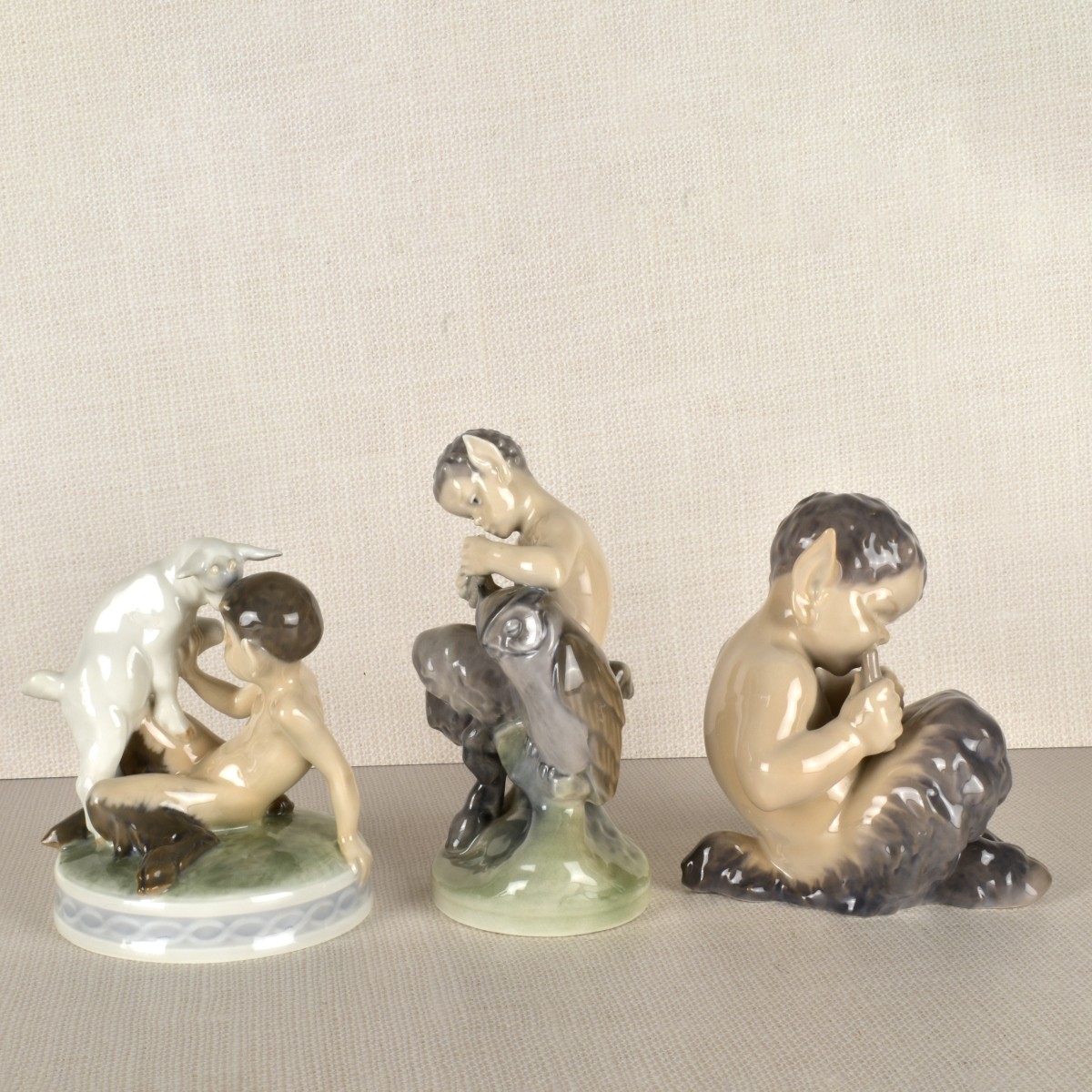 Three Royal Copenhagen Satyr / Pan Figurines