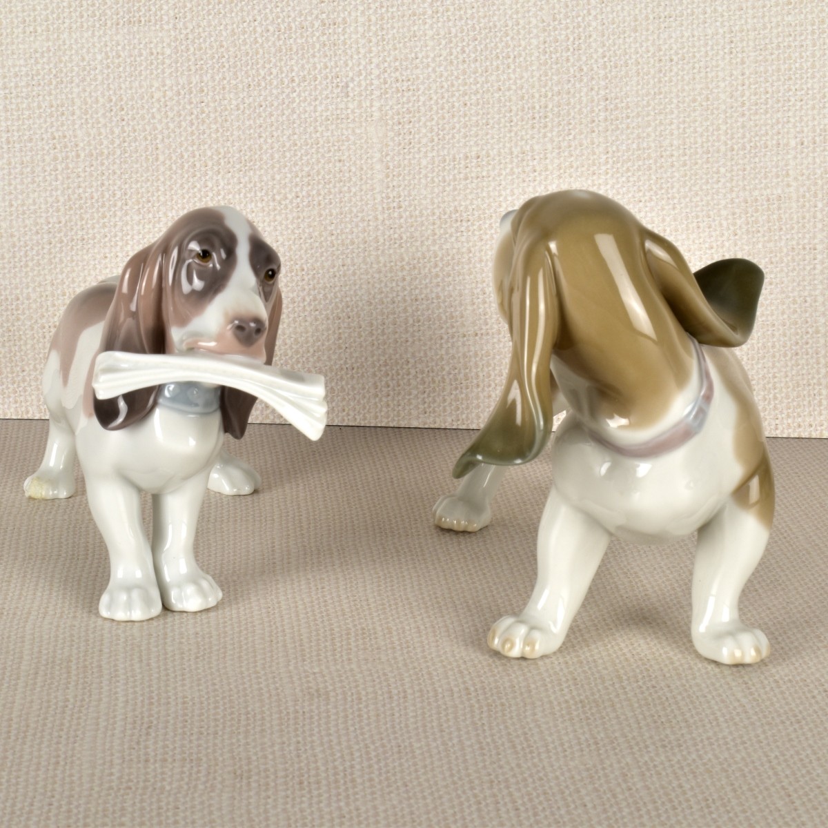 Two Lladro Porcelain Basset Hound Figurines