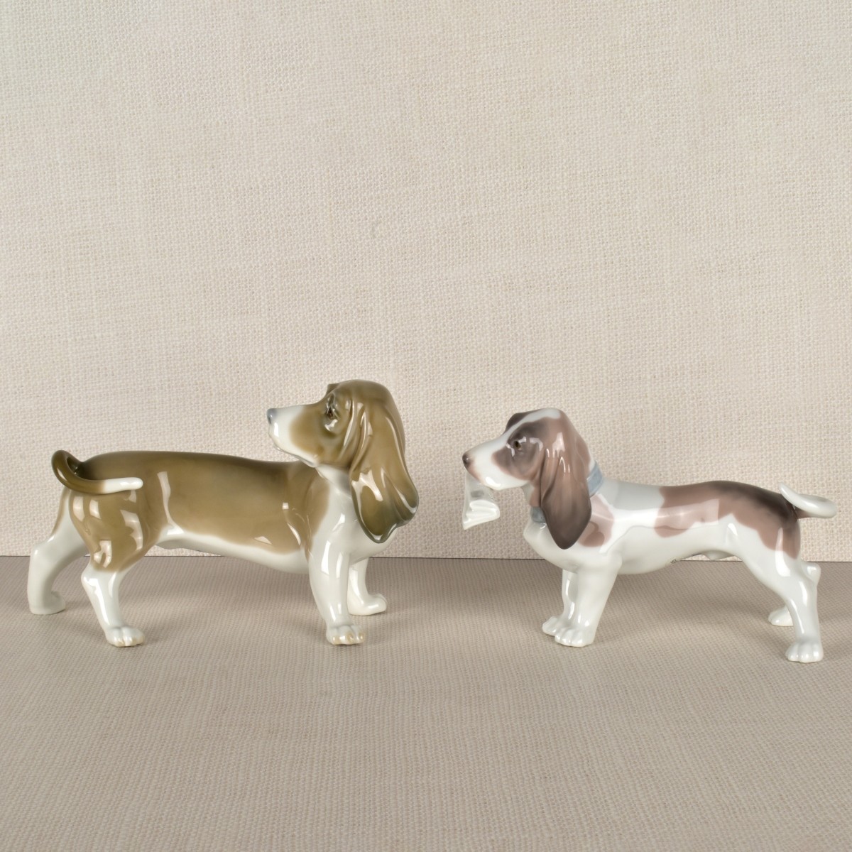 Two Lladro Porcelain Basset Hound Figurines