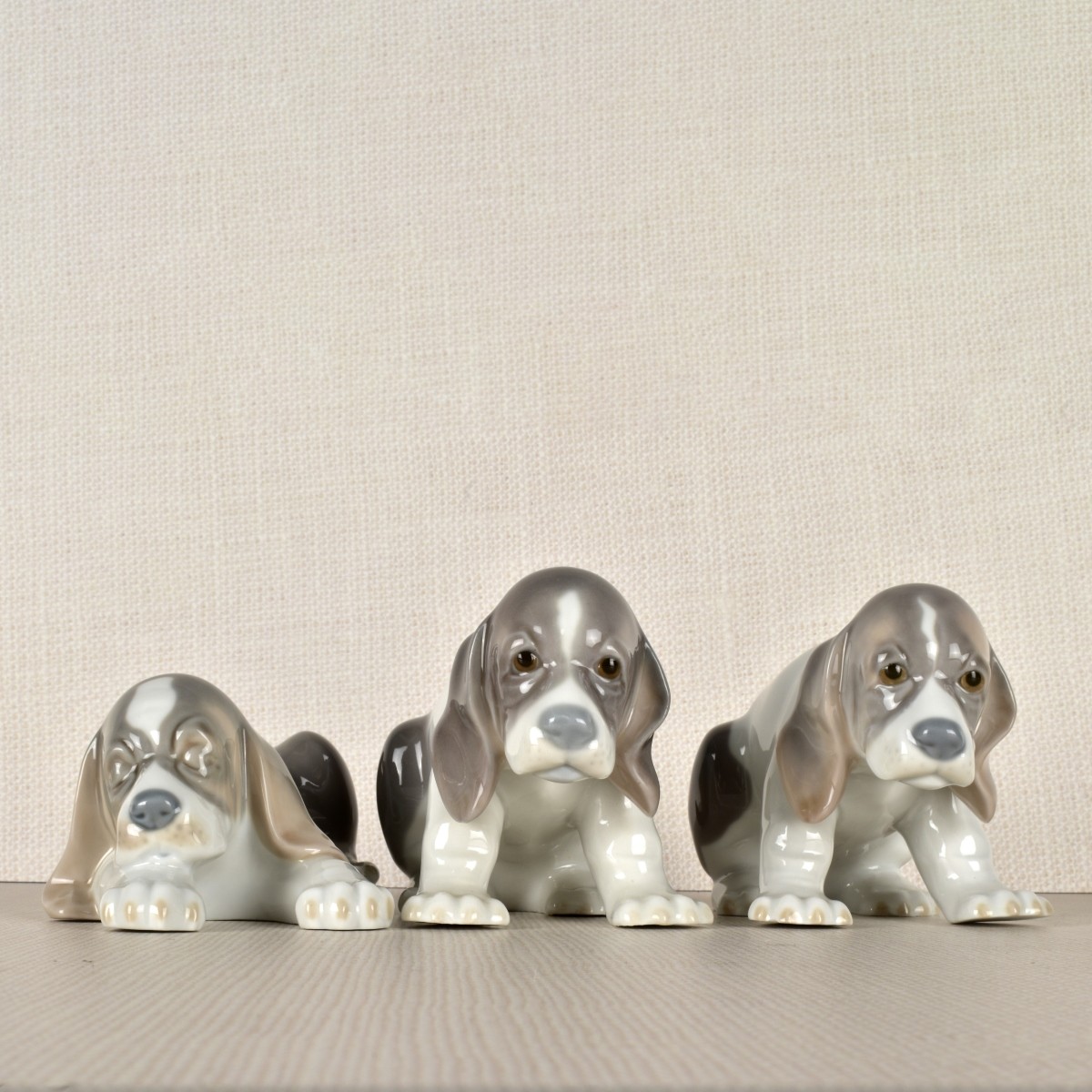 Three Lladro Porcelain Puppy Figurines