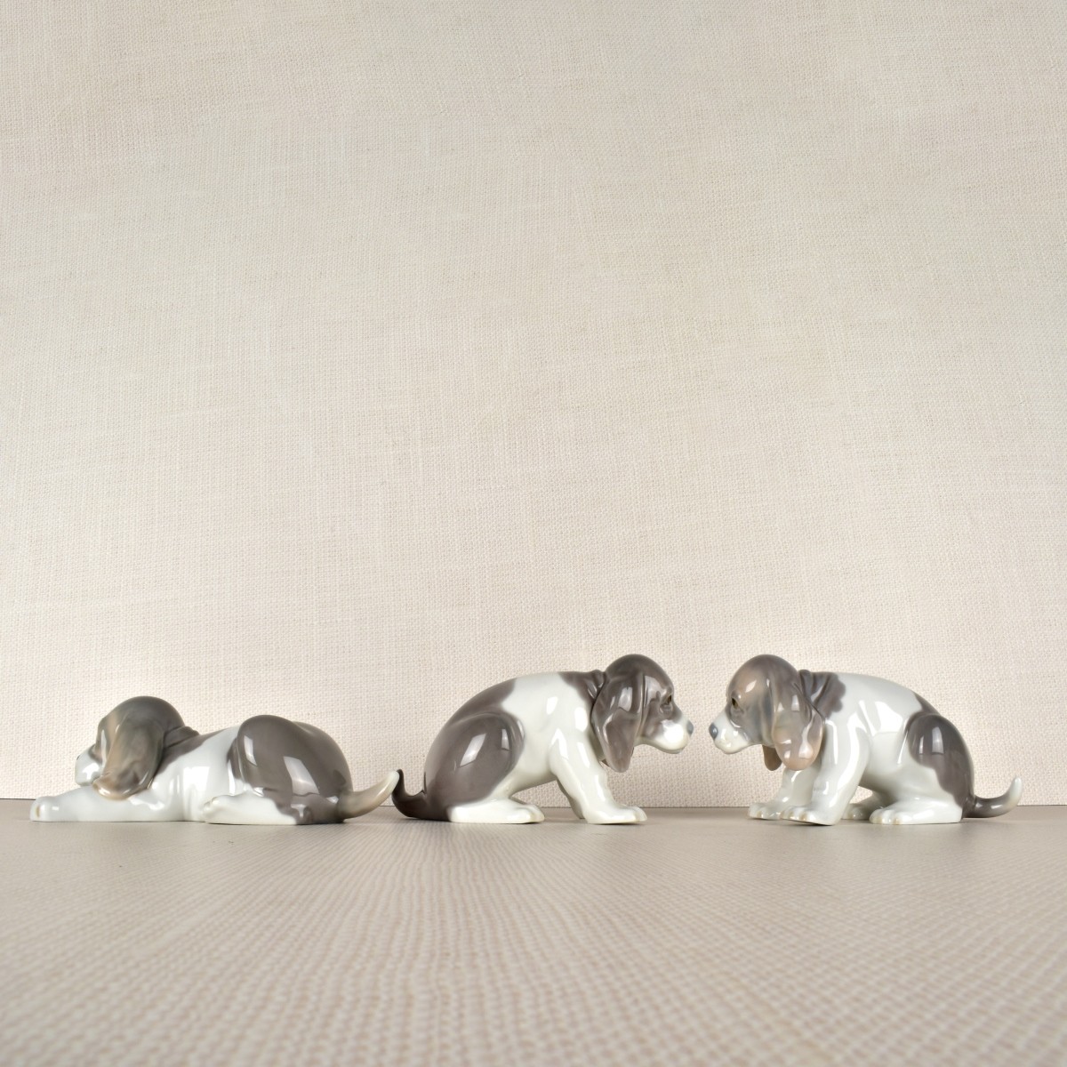 Three Lladro Porcelain Puppy Figurines