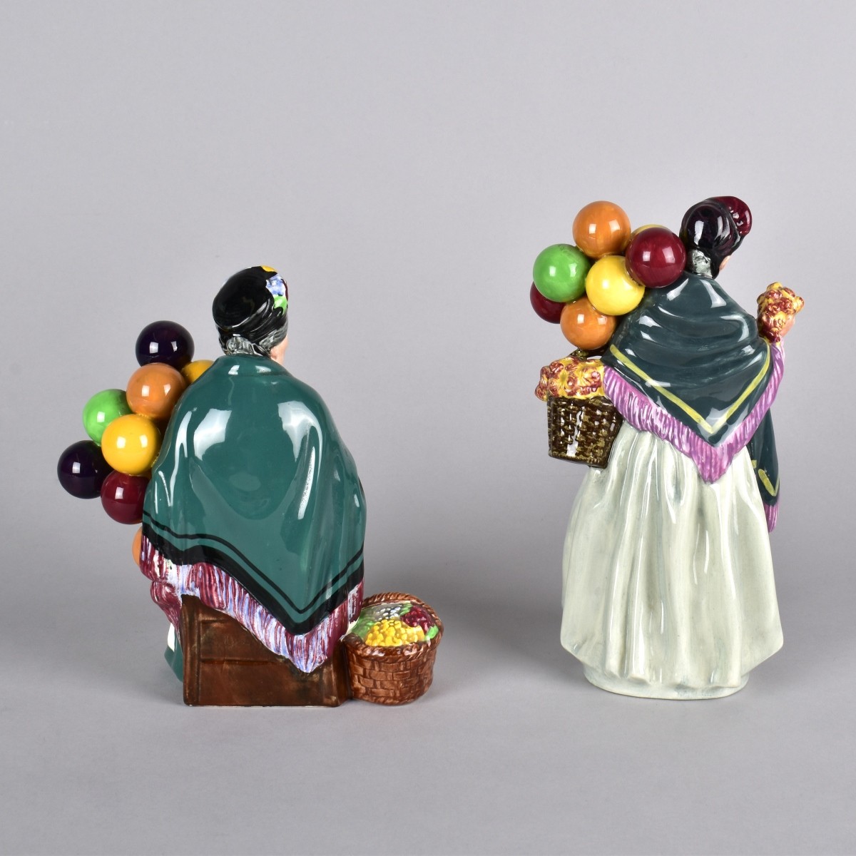 Two Royal Doulton Balloon Sellers