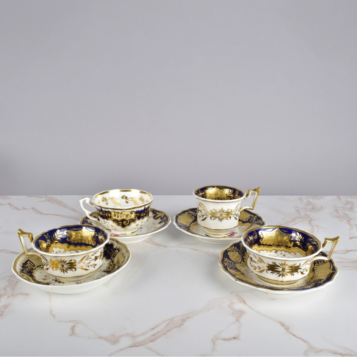 Antique French Porcelain Cups and Saucers