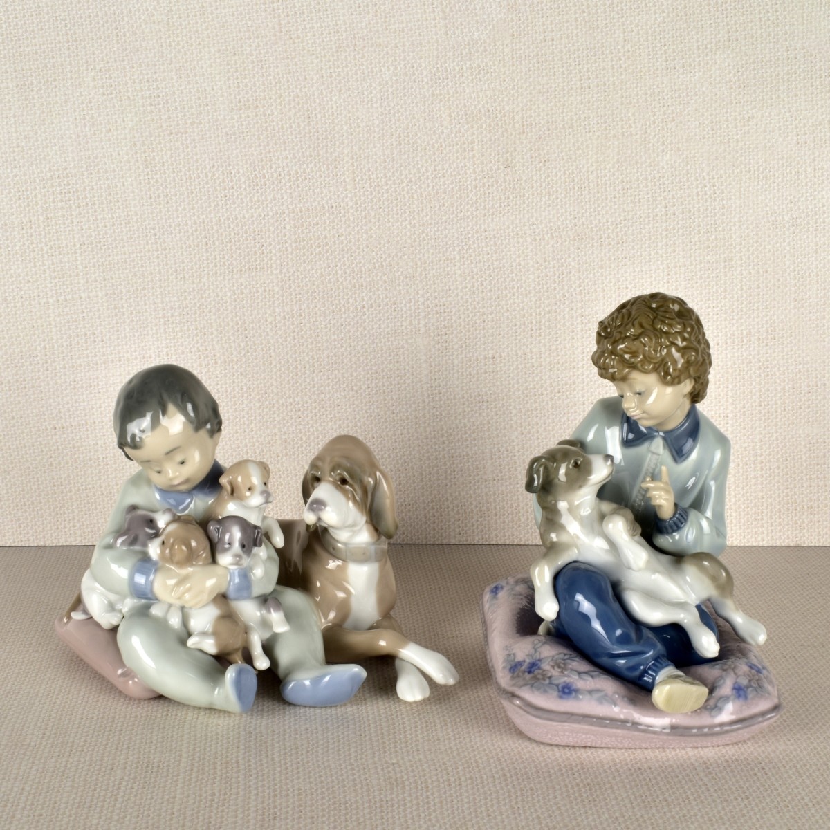 Two Lladro Porcelain Children with Dogs