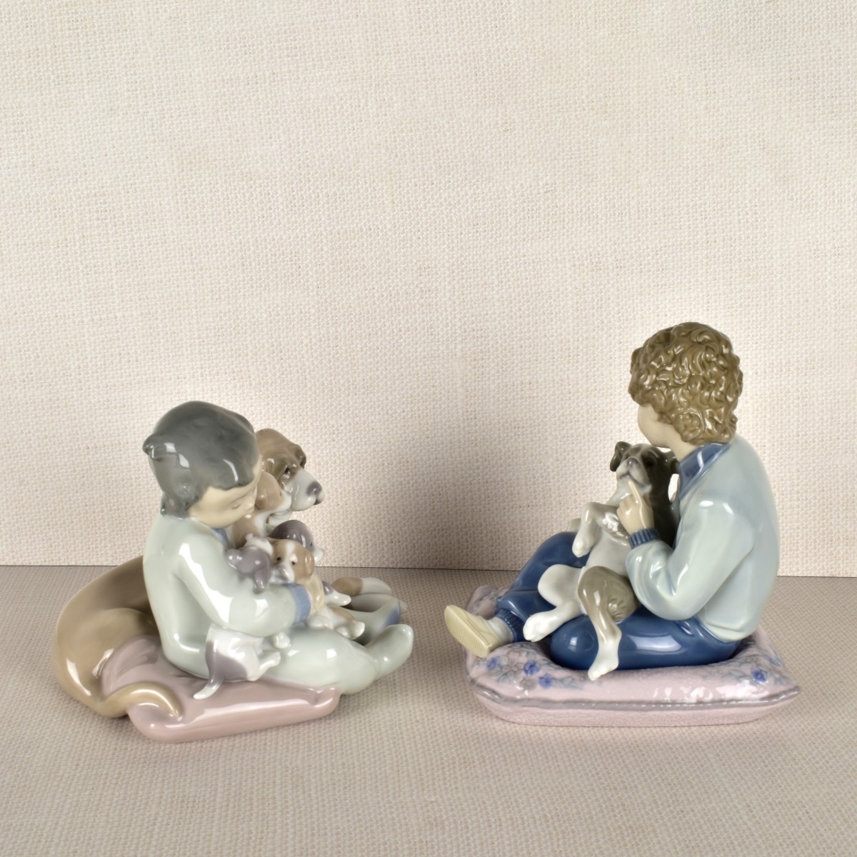 Two Lladro Porcelain Children with Dogs