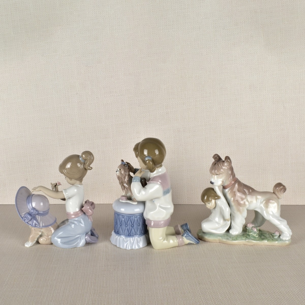 Three Lladro Figurines Children with Dogs.