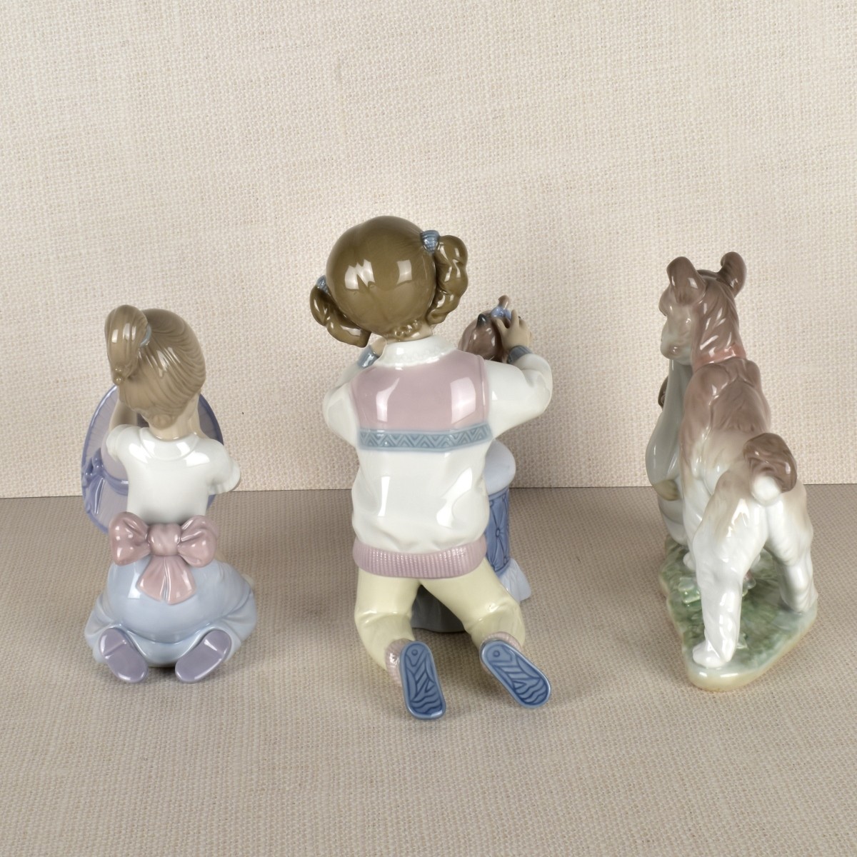 Three Lladro Figurines Children with Dogs.