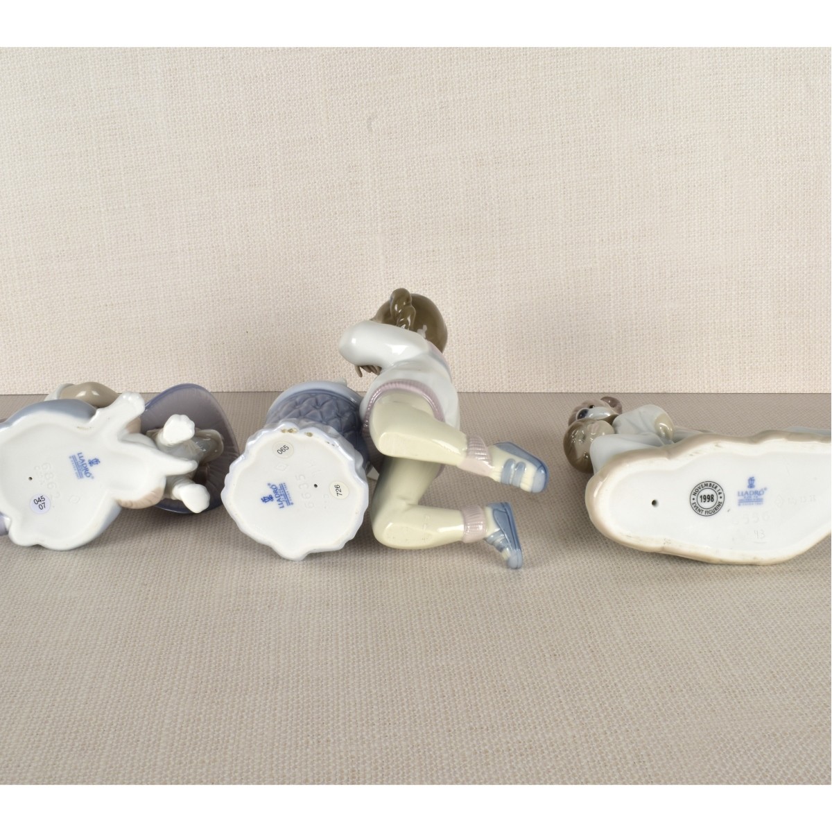 Three Lladro Figurines Children with Dogs.